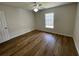 Bedroom with vinyl floors, neutral paint, and a ceiling fan at 2443 Lake View Blvd, Port Charlotte, FL 33948