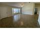 Bright living room featuring tile flooring and large windows at 2443 Lake View Blvd, Port Charlotte, FL 33948