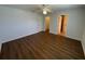 Spacious primary bedroom with vinyl flooring, walk-in closet and ensuite bathroom at 2443 Lake View Blvd, Port Charlotte, FL 33948