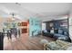 Open-concept living room and dining area with stylish decor and a relaxing atmosphere at 26125 Copiapo Cir, Punta Gorda, FL 33983
