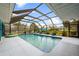 Beautiful pool with screened enclosure and well-maintained landscaping at 26125 Copiapo Cir, Punta Gorda, FL 33983