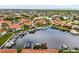 Aerial view of waterfront homes with private boat docks on a canal, showcasing the community's access to waterways at 2630 Tarpon Cove Dr # 212, Punta Gorda, FL 33950