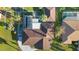 Birds eye view of home with mature landscaping, long driveway and canal access at 372 Cory St, Port Charlotte, FL 33953