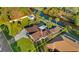 Aerial view of home showcasing the mature landscaping, and waterfront backyard at 372 Cory St, Port Charlotte, FL 33953