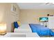 Bedroom features an air conditioning unit and a TV on top of white shelves for storage at 372 Cory St, Port Charlotte, FL 33953