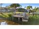 Waterfront view from private dock with chairs and table at 372 Cory St, Port Charlotte, FL 33953