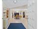 Open floor plan showcasing a formal dining area adjacent to a spacious living room at 372 Cory St, Port Charlotte, FL 33953
