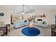 Large living space with stylish furniture, decorative rug, and a fireplace focal point at 372 Cory St, Port Charlotte, FL 33953
