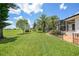 Enjoy this spacious landscaped backyard with patio overlooking the golf course at 3724 Bordeaux Dr, Punta Gorda, FL 33950