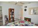 Comfortable bedroom with a full bookcase and floral bedspread at 3724 Bordeaux Dr, Punta Gorda, FL 33950