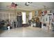 Spacious garage featuring lots of storage space and a work area for projects at 3724 Bordeaux Dr, Punta Gorda, FL 33950