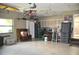 The garage has lots of cabinets, work area, storage, and a window providing natural light at 3724 Bordeaux Dr, Punta Gorda, FL 33950