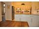 Bright kitchen with island, stainless appliances and ample countertop space at 3724 Bordeaux Dr, Punta Gorda, FL 33950