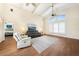 Bright living room with high ceilings, hardwood floors, and plenty of natural light at 3724 Bordeaux Dr, Punta Gorda, FL 33950