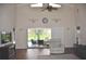Well-lit living room boasts high ceilings, and a view of the pool at 3724 Bordeaux Dr, Punta Gorda, FL 33950