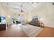 Spacious living room with high ceilings, hardwood floors, a ceiling fan, and comfortable seating at 3724 Bordeaux Dr, Punta Gorda, FL 33950