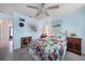 Comfortable main bedroom with light-colored wood floors and light blue walls at 3724 Bordeaux Dr, Punta Gorda, FL 33950