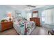 Comfortable main bedroom with light-colored wood floors at 3724 Bordeaux Dr, Punta Gorda, FL 33950