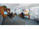 A spacious office with ample desk space and natural light from two windows at 3724 Bordeaux Dr, Punta Gorda, FL 33950