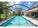 Enjoy this large screened-in in-ground pool overlooking the outdoor living space at 3724 Bordeaux Dr, Punta Gorda, FL 33950