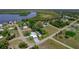 Scenic aerial shot of a single-Gathering home with a private dock on a serene canal at 405 Ridgecrest Dr, Punta Gorda, FL 33982