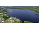 Breathtaking aerial view shows a beautiful bay, with a home and dock near canal access to the ocean at 405 Ridgecrest Dr, Punta Gorda, FL 33982