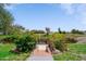 Property with a private boat dock and canal access surrounded by greenery and vegetation at 405 Ridgecrest Dr, Punta Gorda, FL 33982