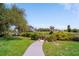 Waterfront property with a private dock and canal access, surrounded by lush landscaping at 405 Ridgecrest Dr, Punta Gorda, FL 33982
