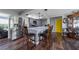 Spacious kitchen featuring an island with seating, stainless appliances and sleek cabinetry at 405 Ridgecrest Dr, Punta Gorda, FL 33982