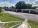 Convenient covered parking area with designated spaces, providing protection for vehicles and easy access at 4158 Tamiami Trl # U4, Port Charlotte, FL 33952