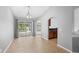 Bright dining room with sliding doors to the pool area at 4268 Leesburg Ave, North Port, FL 34288