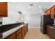 Spacious kitchen with stainless steel appliances and granite counters at 4268 Leesburg Ave, North Port, FL 34288