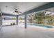 Spacious screened lanai featuring views of the pool and landscaped backyard at 4268 Leesburg Ave, North Port, FL 34288