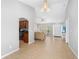 Bright living room connecting to kitchen with tile floors at 4268 Leesburg Ave, North Port, FL 34288