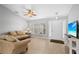 Cozy living room with neutral tones and tile flooring at 4268 Leesburg Ave, North Port, FL 34288