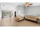 Open-concept living space with natural light and comfortable seating at 4268 Leesburg Ave, North Port, FL 34288