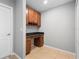 Office space with built-in desk, drawers and overhead cabinets at 4268 Leesburg Ave, North Port, FL 34288