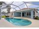 Relaxing screened-in pool area perfect for outdoor entertaining and leisure at 4268 Leesburg Ave, North Port, FL 34288