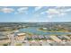 Residential community features gorgeous lake views from above, with serene waters and stunning single Gathering homes at 42771 Valley Brooks St, Punta Gorda, FL 33982