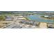 Community aerial view featuring homes, landscaping, and a beautiful lake at 42771 Valley Brooks St, Punta Gorda, FL 33982