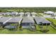 Aerial view showcasing pools, landscaping, and backyard areas at 42771 Valley Brooks St, Punta Gorda, FL 33982