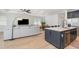 Open floor plan with the living area connecting to the modern kitchen at 42771 Valley Brooks St, Punta Gorda, FL 33982