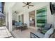 Covered patio with comfortable seating and a grill at 42771 Valley Brooks St, Punta Gorda, FL 33982