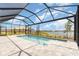 Inviting screened pool area with scenic lake views, perfect for outdoor enjoyment at 42771 Valley Brooks St, Punta Gorda, FL 33982
