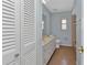 Bathroom showcasing tile flooring, vanity sink and louvered door closet at 4509 Wynkoop Cir, Port Charlotte, FL 33948