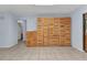 Custom wood cabinets line one wall of this bonus room at 4509 Wynkoop Cir, Port Charlotte, FL 33948