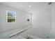 Bright bedroom featuring two windows that offer plenty of natural light at 5018 Cillette Ave, North Port, FL 34288