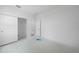 Bright bedroom featuring closet and doorway at 5018 Cillette Ave, North Port, FL 34288
