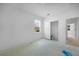 Bright bedroom with a small window, closet, and doorway to another room at 5018 Cillette Ave, North Port, FL 34288