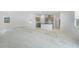 Bright open-concept living space with eat-in kitchen, allowing customization to make it your own at 5018 Cillette Ave, North Port, FL 34288